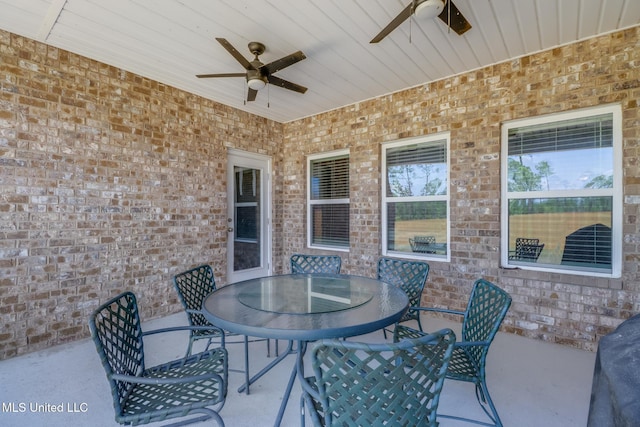 11458 Leann Ct, Ocean Springs, MS 39564 - view of patio featuring a ceiling fan and outdoor dining area