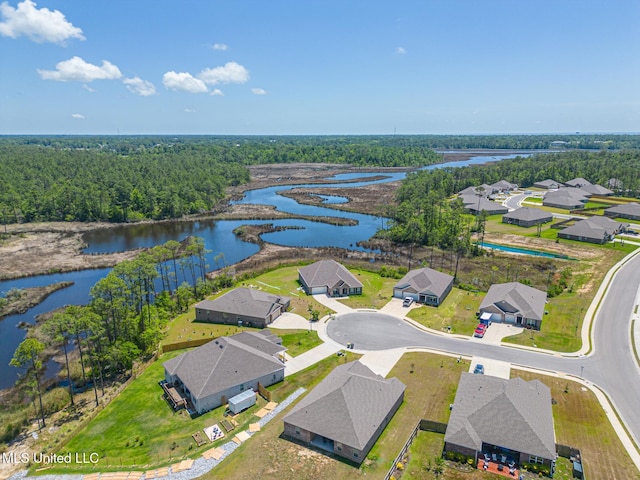 11458 Leann Ct, Ocean Springs, MS 39564 - aerial view of residential area featuring a large body of water and a heavily wooded area