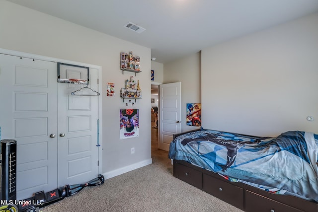 11458 Leann Ct, Ocean Springs, MS 39564 - carpeted bedroom with baseboards and a closet