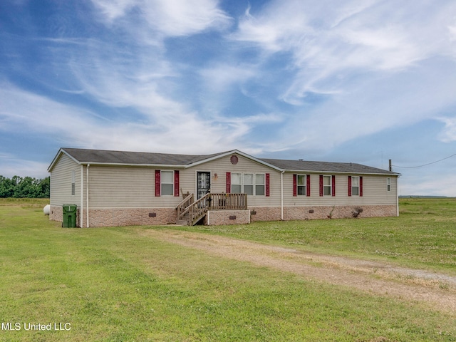 manufactured / mobile home with a front lawn