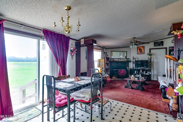 dining space with carpet, a textured ceiling, and ceiling fan with notable chandelier