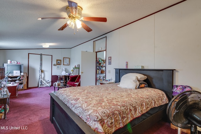 bedroom with crown molding, a textured ceiling, carpet floors, and ceiling fan