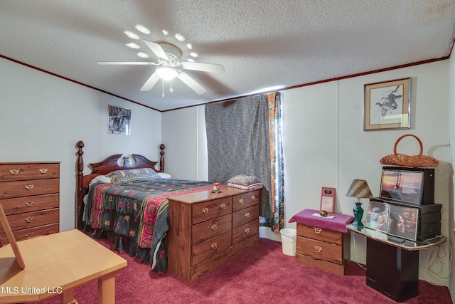 bedroom with ornamental molding, carpet, a textured ceiling, and ceiling fan