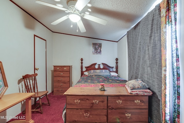 carpeted bedroom featuring ornamental molding, vaulted ceiling, a textured ceiling, and ceiling fan
