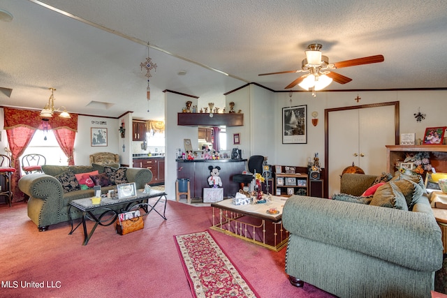 carpeted living room with ornamental molding, vaulted ceiling, a textured ceiling, and ceiling fan