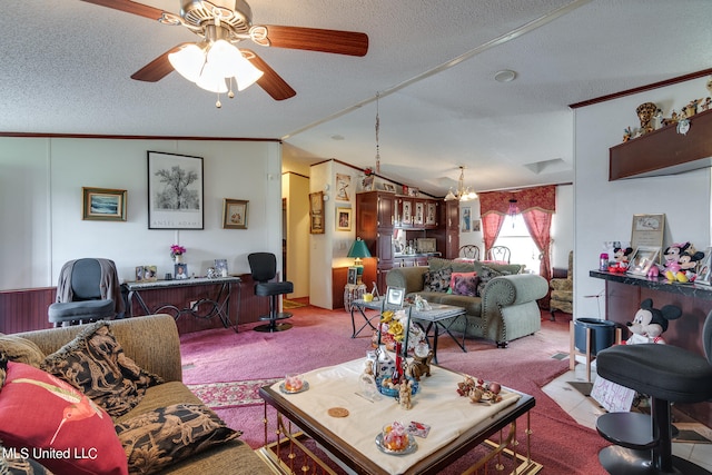 carpeted living room with ceiling fan, a textured ceiling, lofted ceiling, and ornamental molding