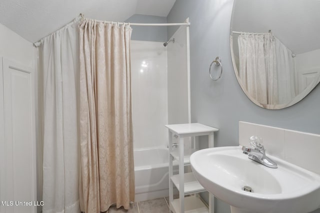 504 Carlisle Cir, Madison, MS 39110 - bathroom with shower / bathtub combination with curtain and a sink