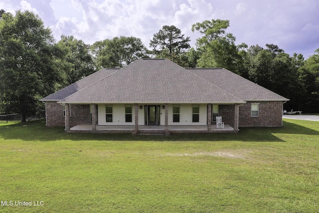 8185 Ridgewood Dr, Kiln, MS 39556 - view of front of property featuring a front yard, brick siding, a porch, and roof with shingles
