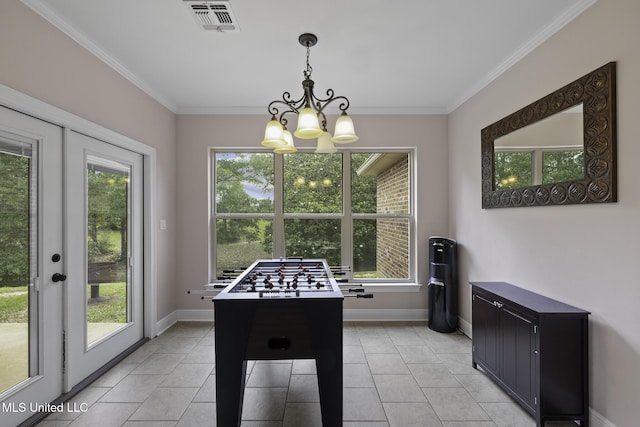 8185 Ridgewood Dr, Kiln, MS 39556 - recreation room with a chandelier, ornamental molding, baseboards, french doors, and light tile patterned floors