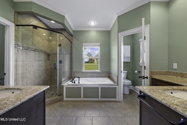8185 Ridgewood Dr, Kiln, MS 39556 - bathroom with a garden tub, two vanities, a shower stall, toilet, and ornamental molding