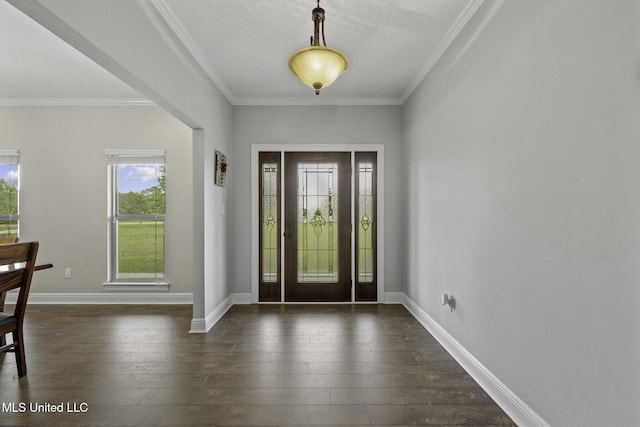 8185 Ridgewood Dr, Kiln, MS 39556 - foyer featuring dark wood-style floors, crown molding, and baseboards