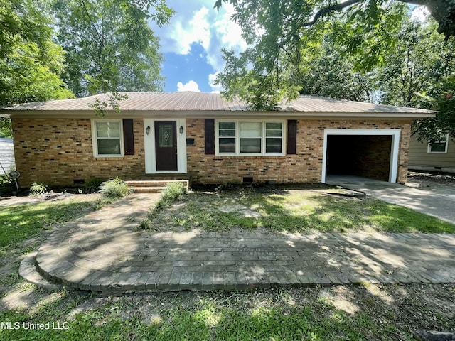 1103 N Yale St, Cleveland, MS 38732 - ranch-style home with crawl space, a garage, brick siding, metal roof, and concrete driveway