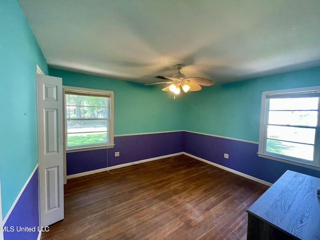 1103 N Yale St, Cleveland, MS 38732 - unfurnished bedroom featuring wood finished floors, baseboards, and ceiling fan