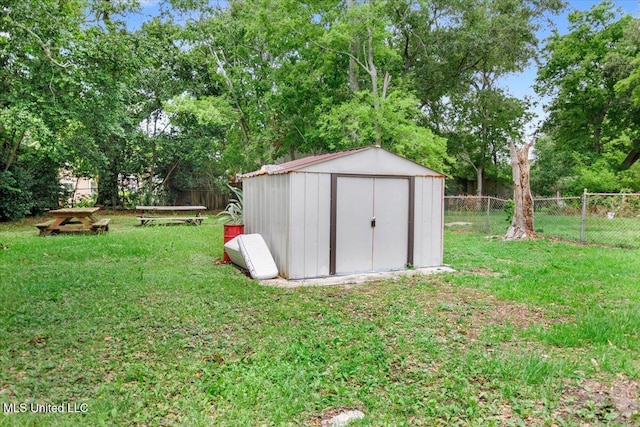415 Dacey St, Biloxi, MS 39530 - view of shed featuring view of wooded area