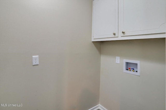 washroom with cabinets and washer hookup