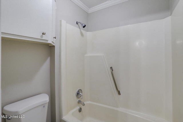 bathroom with shower / bath combination, ornamental molding, and toilet