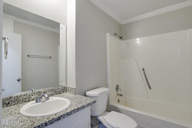 full bathroom featuring crown molding, vanity, toilet, and bathtub / shower combination