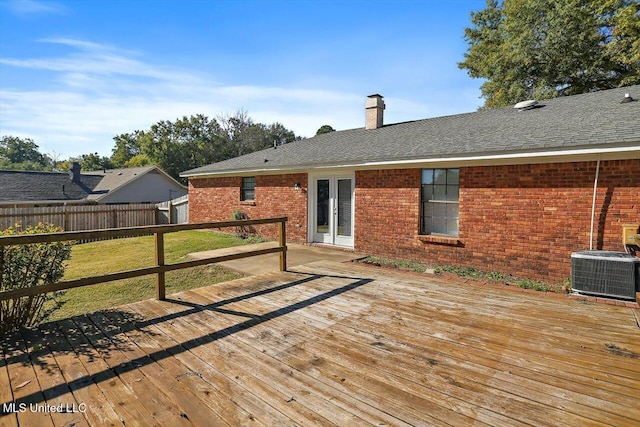 deck with cooling unit and a yard