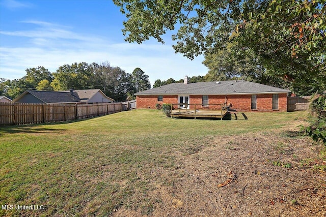 view of yard featuring a deck