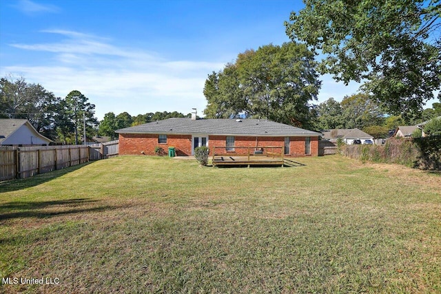 view of yard featuring a deck