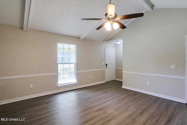 spare room featuring lofted ceiling with beams, dark wood-type flooring, and ceiling fan