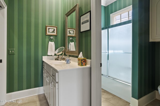 150 Harper St, Ridgeland, MS 39157 - bathroom featuring wallpapered walls, vanity, enclosed tub / shower combo, tile patterned floors, and toilet