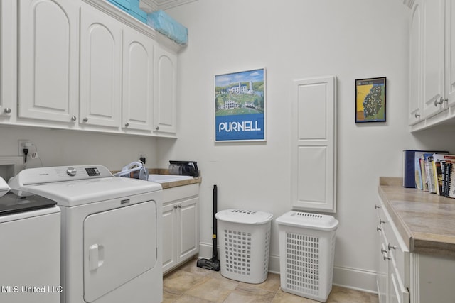 150 Harper St, Ridgeland, MS 39157 - washroom with cabinet space, separate washer and dryer, and baseboards