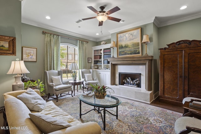 150 Harper St, Ridgeland, MS 39157 - living room featuring a ceiling fan, wood finished floors, recessed lighting, a premium fireplace, and crown molding