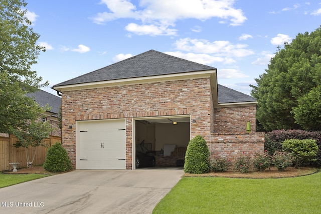 150 Harper St, Ridgeland, MS 39157 - view of property exterior featuring driveway, brick siding, a shingled roof, and an attached garage