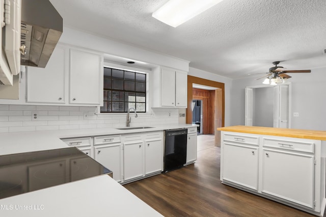 kitchen with dishwasher, white cabinetry, tasteful backsplash, sink, and ceiling fan