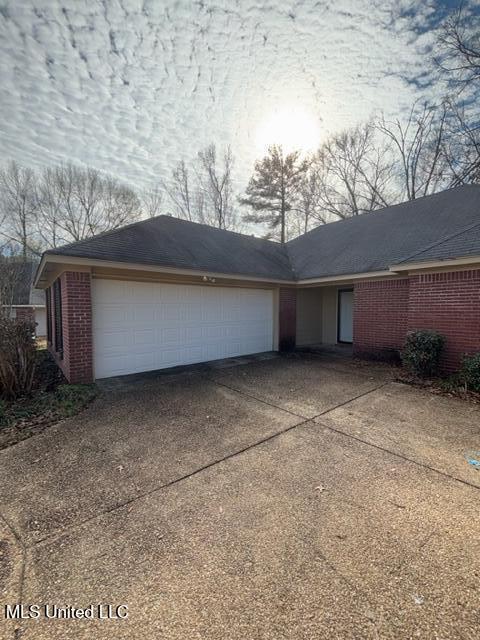 exterior space with a garage