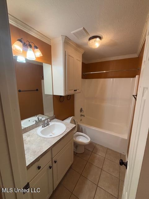 full bathroom with tile patterned floors, crown molding, and a textured ceiling