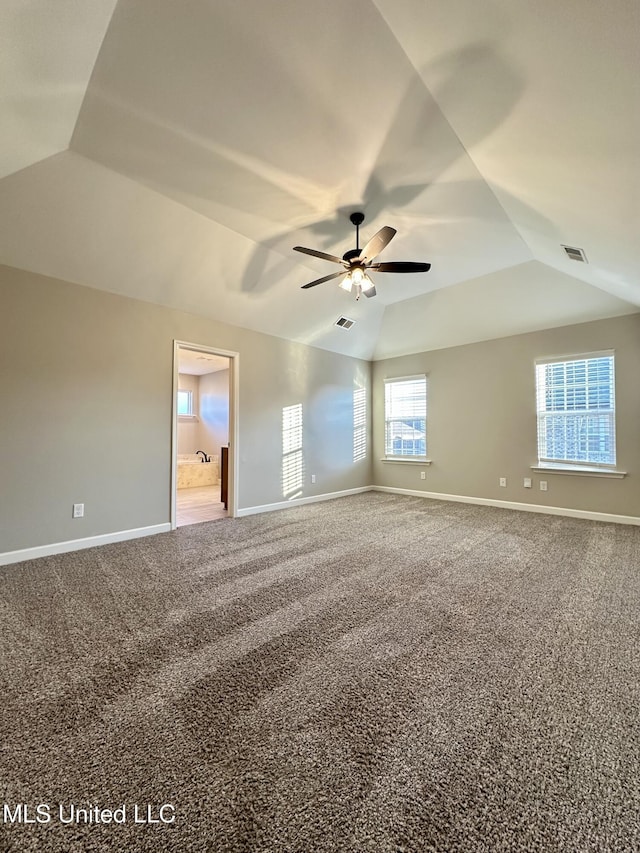 spare room with carpet flooring, ceiling fan, and lofted ceiling