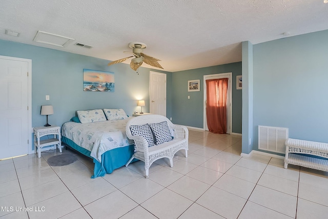 bedroom with light tile patterned flooring, a textured ceiling, and ceiling fan