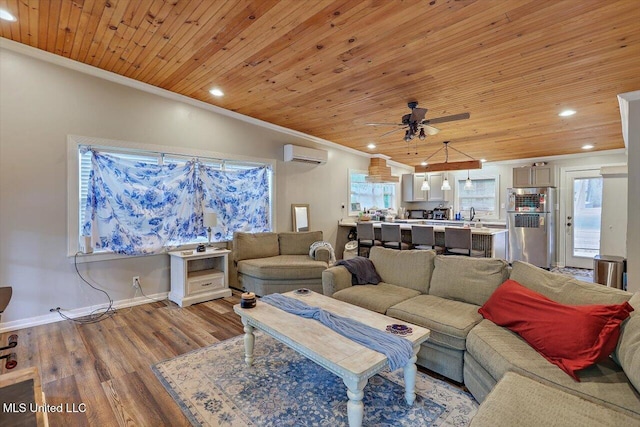 living area featuring wooden ceiling, crown molding, and a wall unit AC