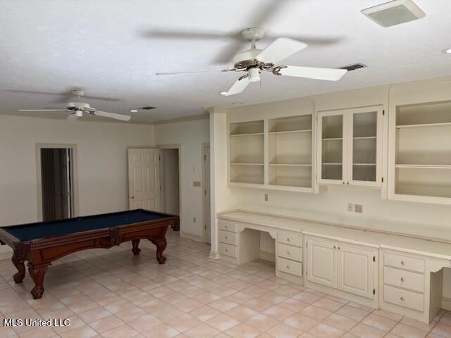recreation room with built in study area, billiards, ceiling fan, and visible vents