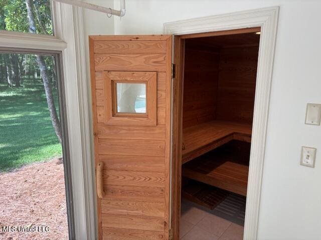 view of sauna / steam room with tile patterned flooring