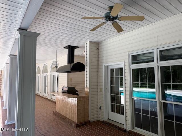 view of patio / terrace with ceiling fan