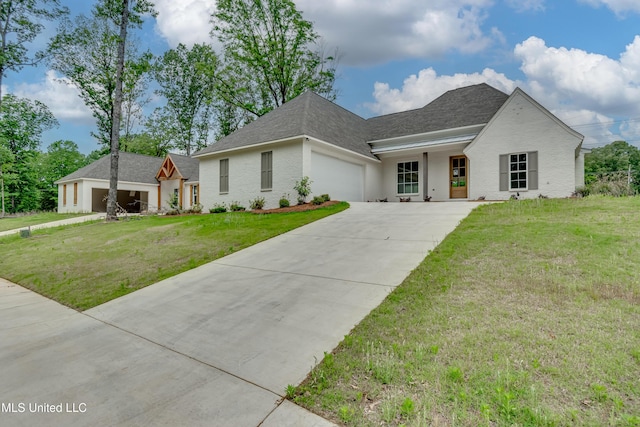 124 Grayson Way, Madison, MS 39110 - view of front of property with a garage, concrete driveway, a front lawn, and roof with shingles