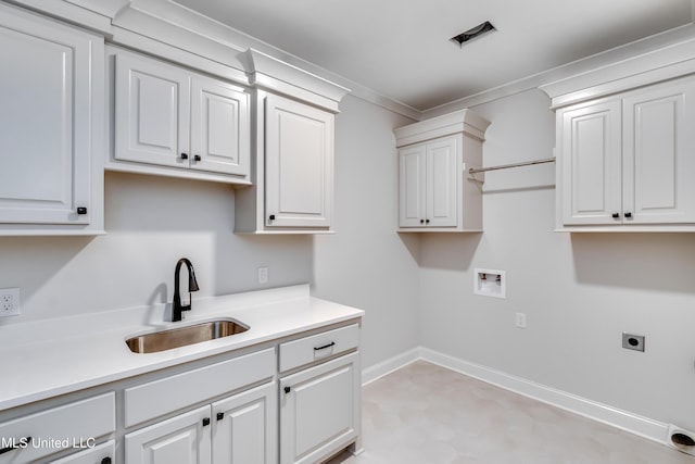 124 Grayson Way, Madison, MS 39110 - washroom with electric dryer hookup, hookup for a washing machine, cabinet space, ornamental molding, and light floors