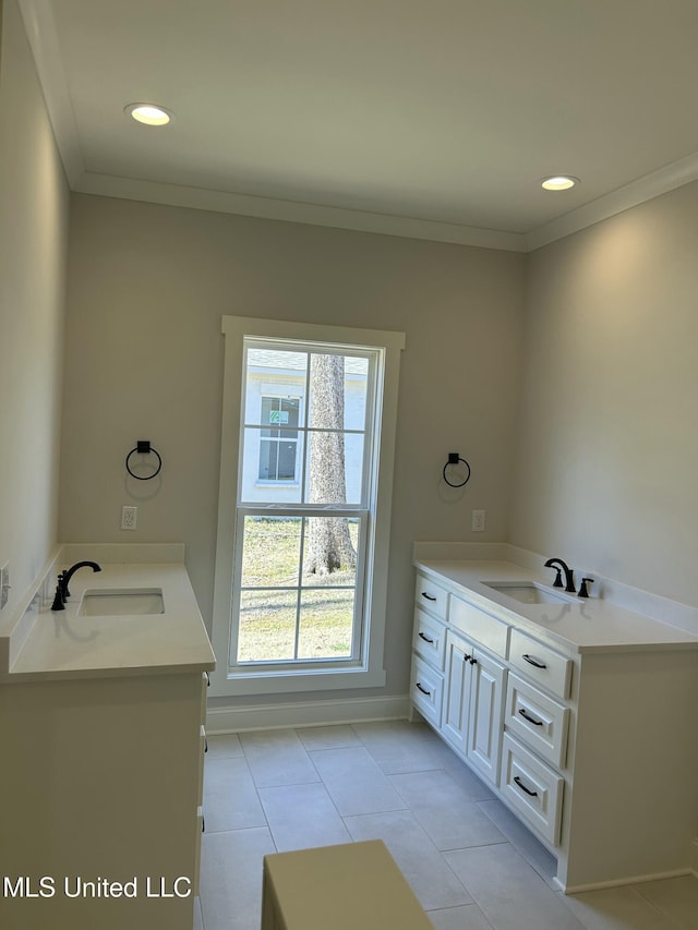 bathroom with tile patterned floors, recessed lighting, vanity, and crown molding