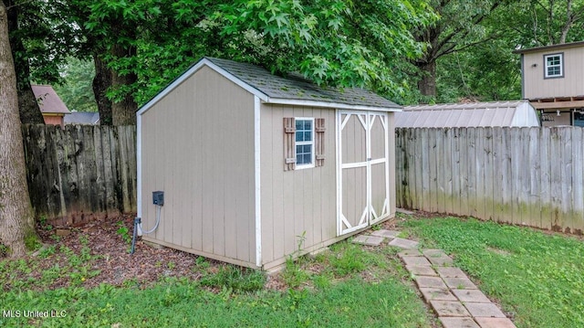 6933 Fox Briar Cv, Walls, MS 38680 - view of shed with a fenced backyard