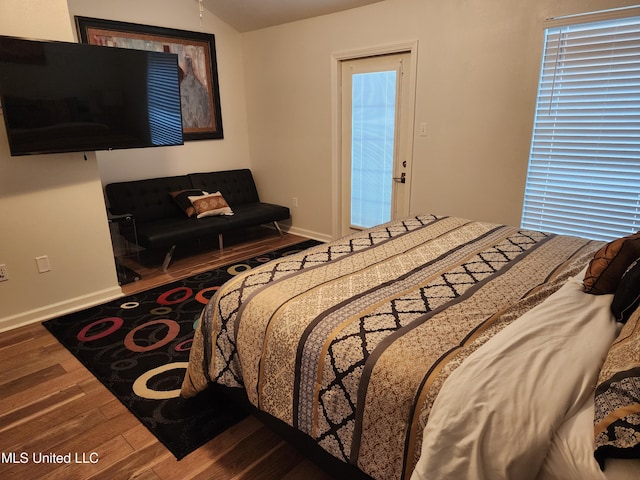 bedroom featuring hardwood / wood-style floors