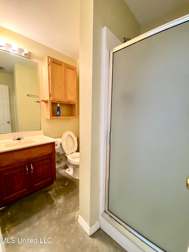 bathroom with concrete floors, a textured ceiling, a shower with shower door, toilet, and vanity