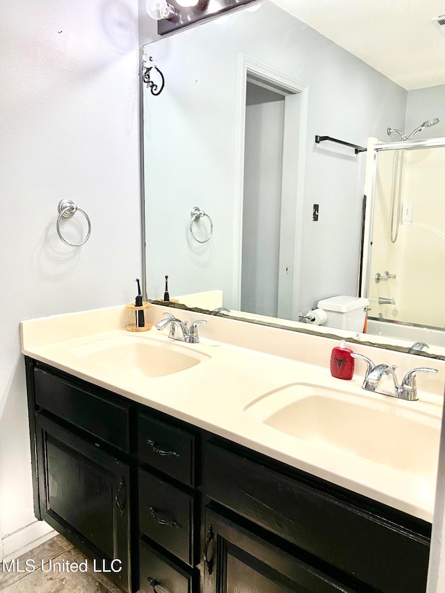 full bathroom with vanity, shower / washtub combination, and toilet