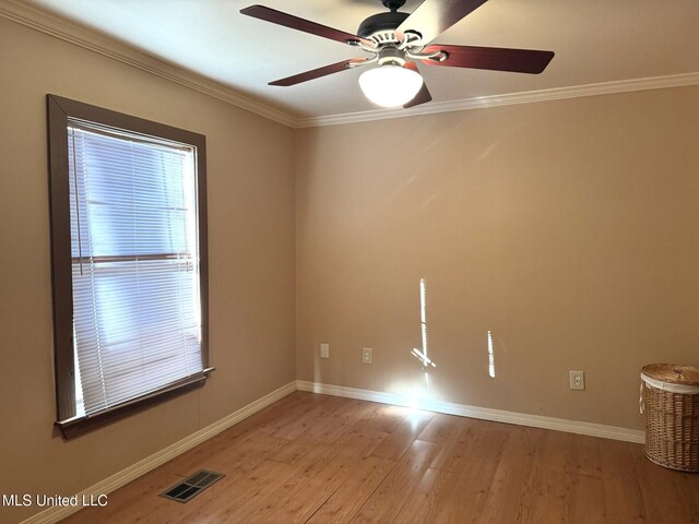 46 Stirling Rd, Natchez, MS 39120 - spare room with ceiling fan, light hardwood / wood-style floors, and ornamental molding