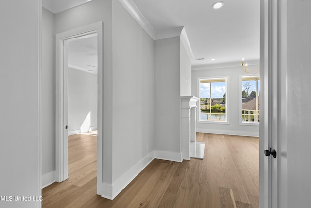 126 Herons Bay Cir Lot 1136, Madison, MS 39110 - hall featuring crown molding, wood finished floors, a chandelier, baseboards, and recessed lighting