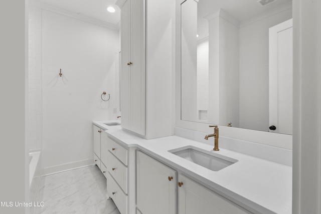 bathroom with vanity, crown molding, and separate shower and tub