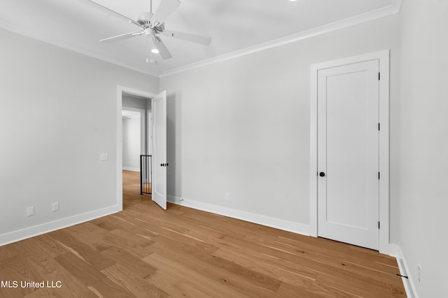 unfurnished room with ceiling fan, ornamental molding, and light hardwood / wood-style flooring