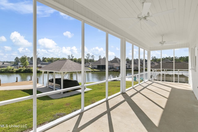 126 Herons Bay Cir Lot 1136, Madison, MS 39110 - unfurnished sunroom featuring a ceiling fan, a residential view, and a water view